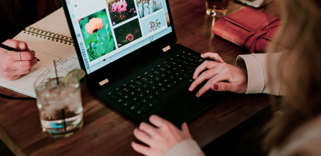woman browsing website on laptop